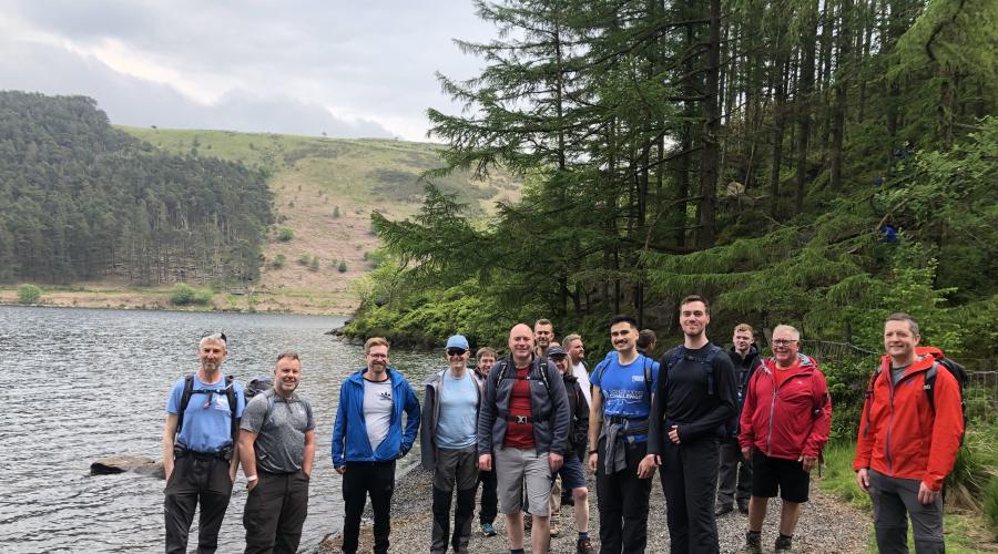 hikers in front of pub