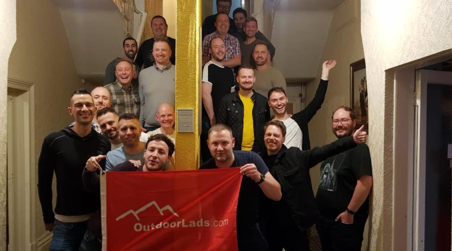 An event at Bingley Little Theatre showing people seated at tables and getting refreshments next to a pop up banner