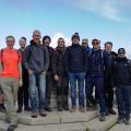 Group of walkers at the summit of Worcestershire Beacon, Malvern Hills 