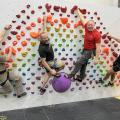Outdoorlads climbers on the rainbow feature wall