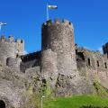 Conwy castle with the rainbow behind