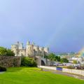 Conwy Castle with a rainbow behind